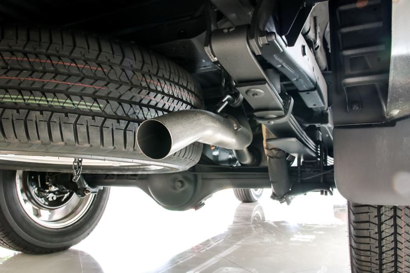 Exhaust pipe and under carriage of a car